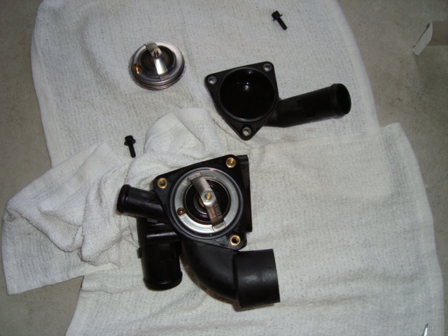 How to put a thermostat in a 2000 ford taurus #8